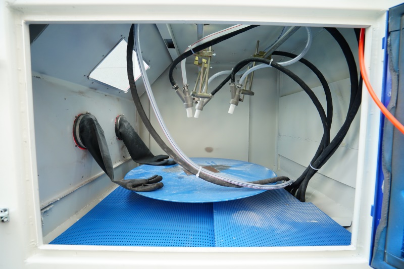 máquina de jateamento de areia automática de roda com plataforma giratória